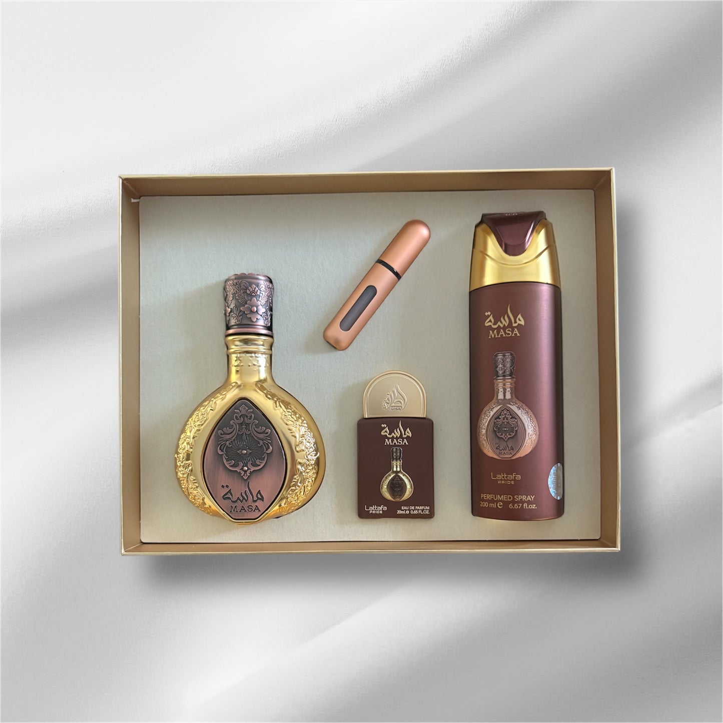 Coffret Lattafa Pride Masa : un parfum ml , un parfum ml , un déodorant 200 ml et un échantillon à remplir