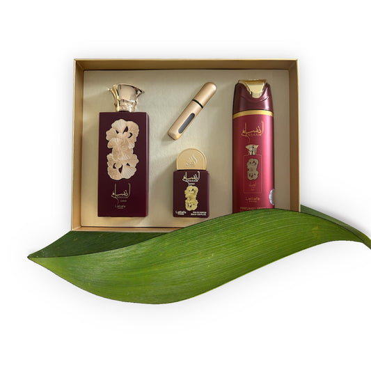 Coffret Lattafa Pride Ansaam Gold : un parfum 100 ml , un parfum 20 ml , un déodorant 200 ml et un échantillon à remplir